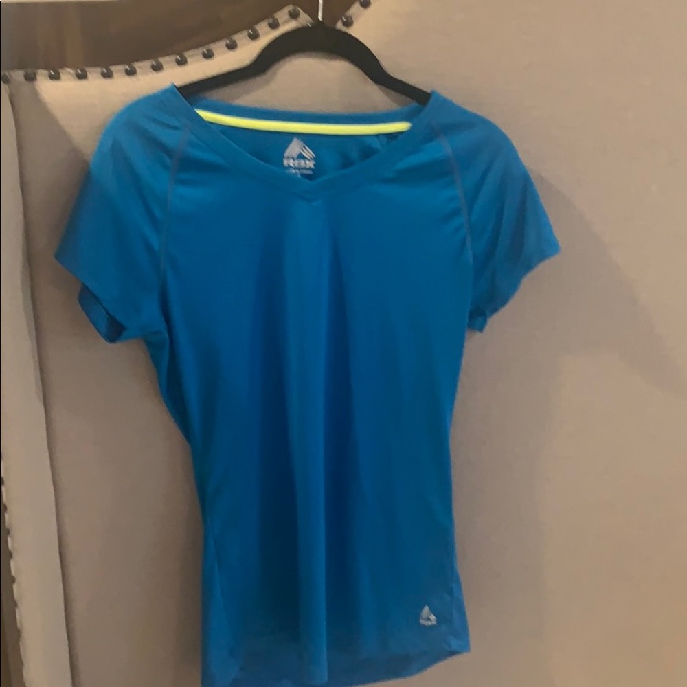 - RBX workout top color blue in size m